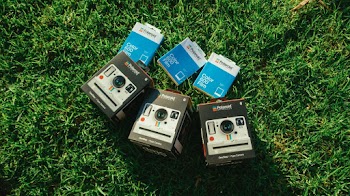 Three Gray Polaroid Camera Boxes