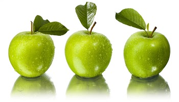 three green apples with water drops