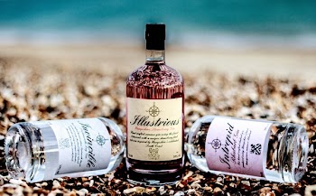 Three Liquor Bottles on Brown Rocks