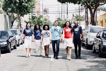 Three Men and Three Women Walking on Street