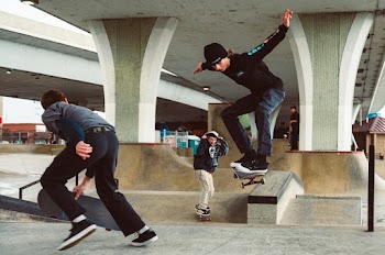 Three Men Skating