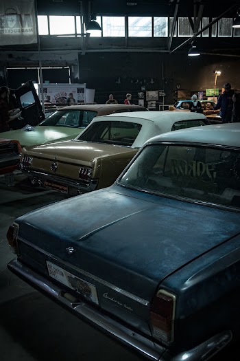 Three Parked Vintage Vehicles