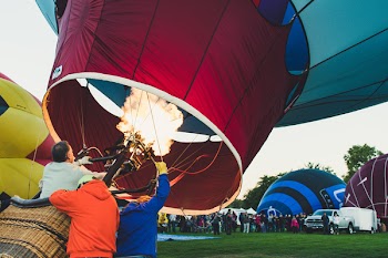 Three People Inside the Hot Air Balloon
