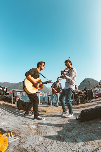 Three People Playing Instruments