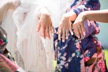 Three People Showing Off Rings