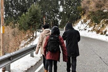 Three People Walking