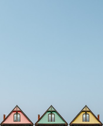 Three Pink, Green, and Yellow Houses
