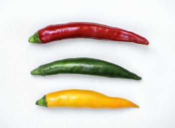 Three Red, Green, and Yellow Chili