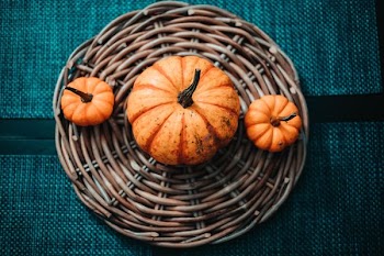 three squash on basket