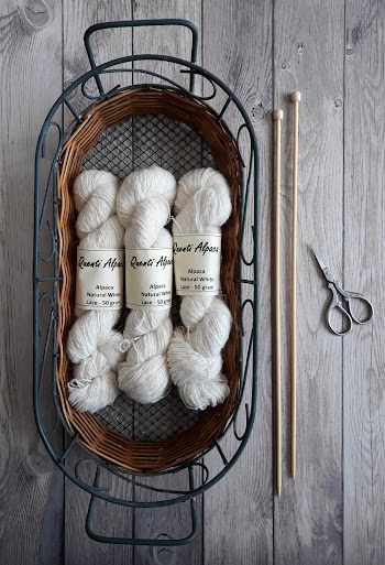 Three White Twines on Oval Wicker Basket