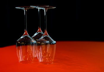 Three Wine Glass on Red Surface
