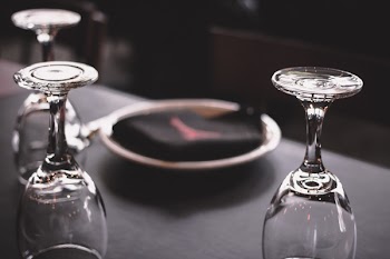 Three Wine Glasses on Black Surface