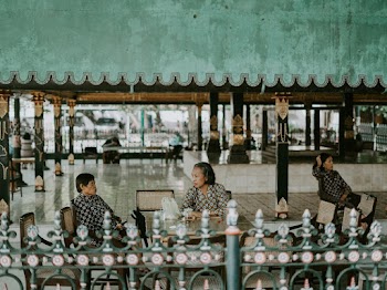 Three Woman Sitting on the Chairs Waiting