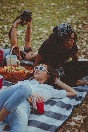 Three Women Having a Picnic