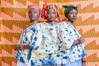 Three Women in White-and-blue Top