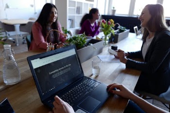 Three Women on Table