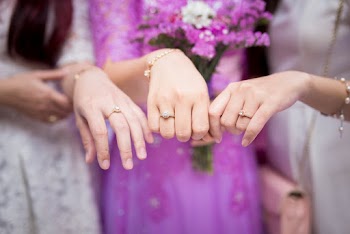 Three Women Showing Solitaire Rings