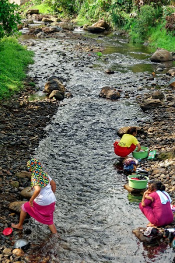 Three Women Washing Clothes At The River