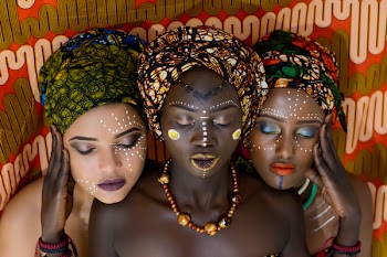 Three Women Wearing Turbands