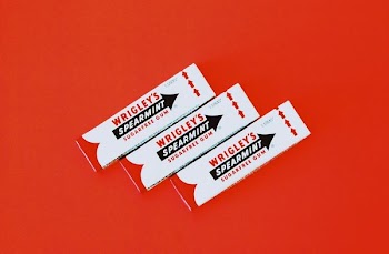 three Wrigley's spearmint gum packs