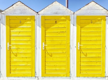 Three Yellow Wooden Doors