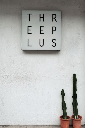 Threeplus Signboard on Wall