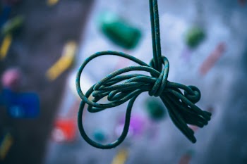 Tied Green Rope in Shallow-focus Shot