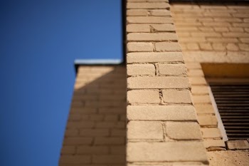 tilt photography of wall bricks