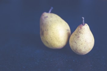 Tilt Shift Photo of Two Pears