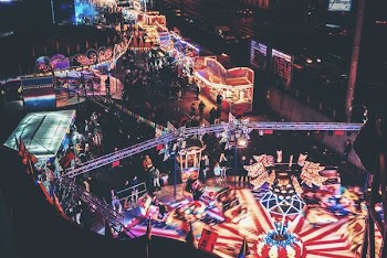 time lapse photo of amusement park taken at nighttime