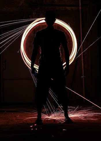 Time-lapse Photo of Poi Dancer