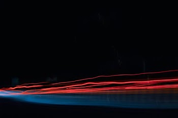 time lapse photo of red lights
