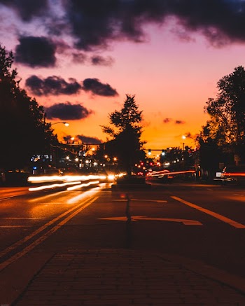 Time-Lapse Photo of Road During Golden Hour