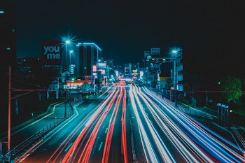 Time-lapse Photo of Roadway During Evening