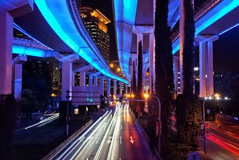 Time-lapse Photo of Vehicle on Road during Night
