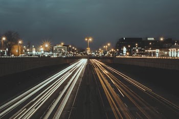 time lapse photograph of roadway