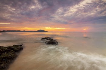 Time-lapse Photograph of Seashore during Golden Hour