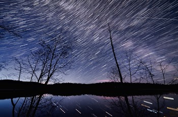 Time Lapse Photography of Body of Water at Nighttime