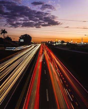 Time Lapse Photography Of Cars Moving On Road