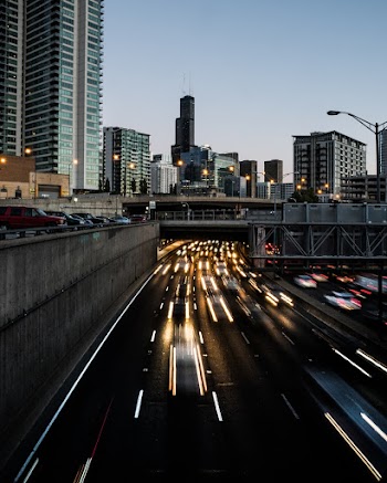 Time Lapse Photography of Cars Passing by Near Buildings
