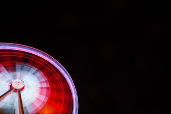time lapse photography of ferris wheel during nighttime