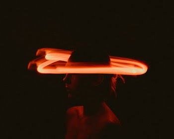 Time Lapse Photography of Light on Woman's Head