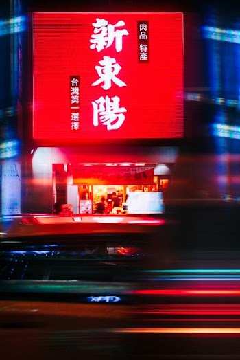 Time Lapse Photography of Non-english Signage