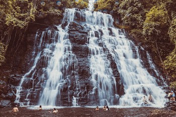 Time-Lapse Photography of People Near Waterfalls