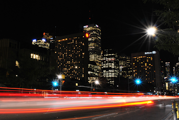 Time Lapse Photography of Red and Orange Taillight in City during Daytime