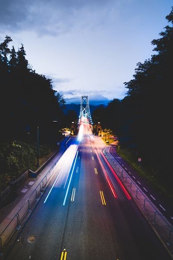 time-lapse photography of road during night
