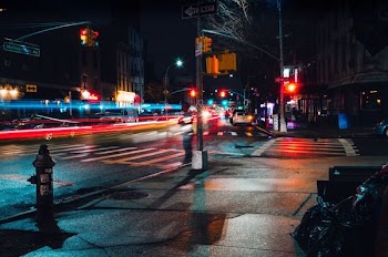 time lapse photography of road during night