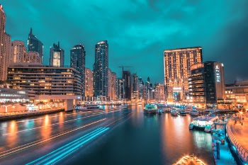 Time Lapse Photography of Road With High-rise Buildings