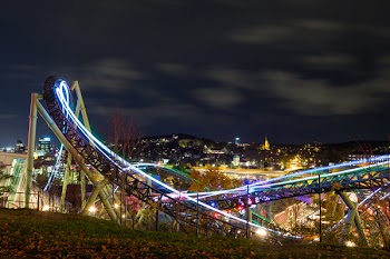 Time-lapse Photography Of Roller Coaster During Night Time