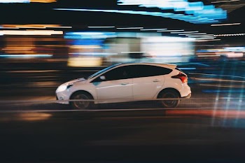 time lapse photography of running car